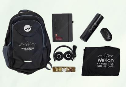 backpack, headphones, chocolate, tshirt. diary, bottle, wireless mouse