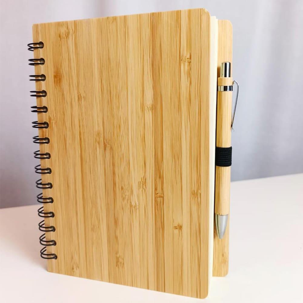 bamboo diary with pen with white paper
